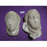 Two vintage plaster cast heads with religious design