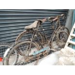 Two vintage bicycles one butchers style and one ladies in need of restoration