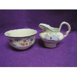 A vintage cream jug and sugar bowl by Copeland Spode in the Jasmine pattern