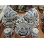 A part tea service by Booths with Chinese dragon print