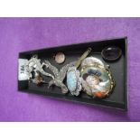 A small selection of white metal jewellery including HM silver locket, amethyst stick pin,