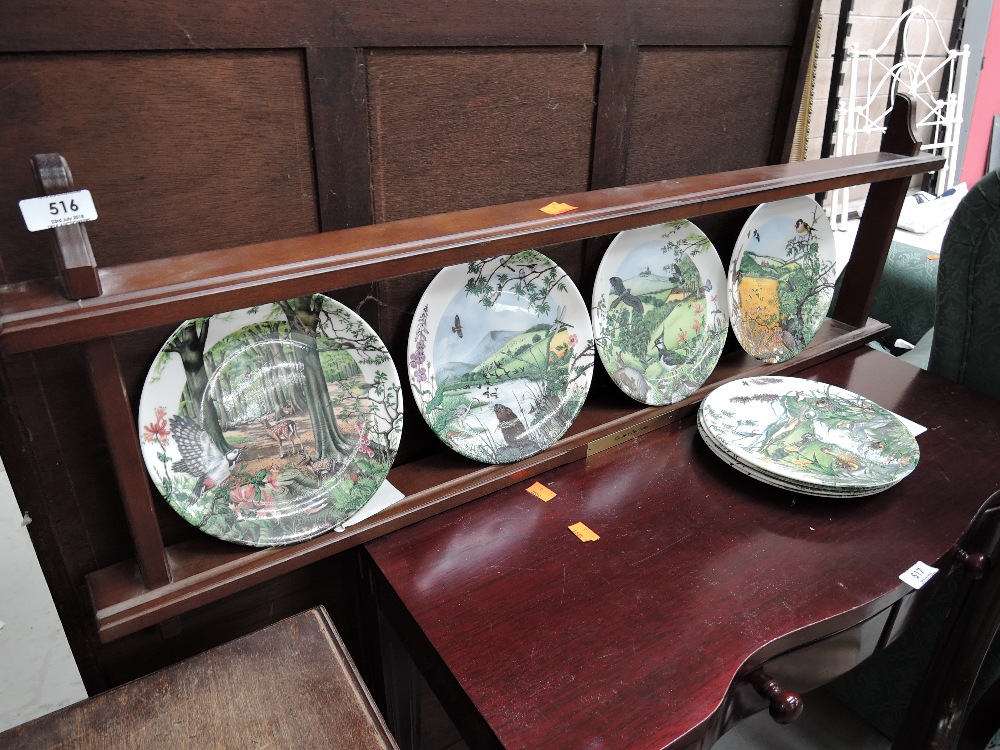 A plate rack and collectors plates Country Panarama by Colin Newman