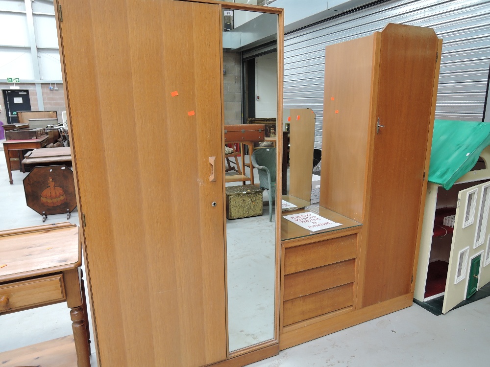 A vintage wardrobe in golden oak style