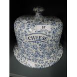 A vintage cheese wedge with a chintz style pattern