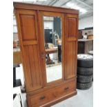 A Victorian style wardrobe with under drawer