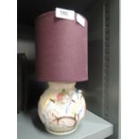 A vintage ceramic bodied bedside lamp