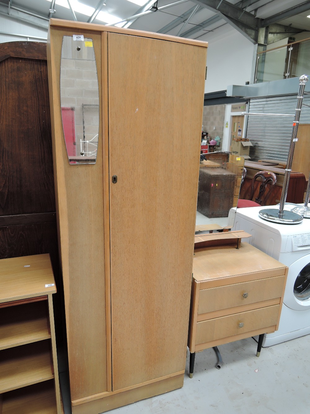 A vintage retro design bedroom set wardrobe and dresser in golden oak