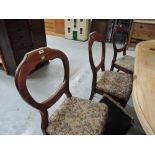 Three Victorian mahogany balloon back dining chairs