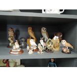 A selection of vintage and modern decorative owl figures and studies