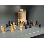 A selection of vintage treen wood turned and carved chess pieces