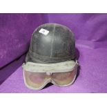 A selection of vintage motor cycle and bike helmet by Everoads and goggles by Octopus