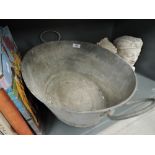 A vintage galvanised wash tub