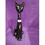 A vintage retro vase in the style of a black cat