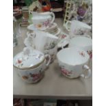 A Royal Crown Derby part tea service in the gilt heightened Derby posies pattern