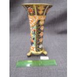 A 19th century Spode vase in gilt heightened Imari palette on trefoil animalistic claw and ball