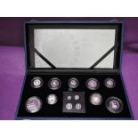 The 2006 Queen's 80th Birthday silver coin collection in case, including Maundy coins