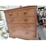 An early 19th century oak chest on chest of 2 short and 3 long drawers over 2 long drawers and