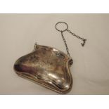 A silver chatalaine purse having engraved decoration and leather lined interior, Birmingham 1918,