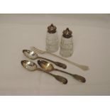 A selection of HM silver including three Georgian teaspoons, a pair of cut glass pepperettes