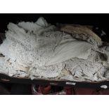 A box of vintage lace edging and pieces including crochet and bobbin etc