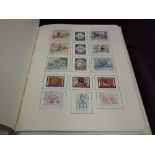 Five albums of World stamps, mainly used