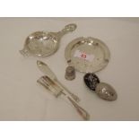 A small selection of HM silver and white metal including ash tray, tea strainer, thimble, sugar