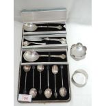 A selection of HM silver including a cased set of teaspoons having coffee bean knops, a napkin ring,