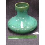 A late 19th century Ruskin vase of squat form with green mottled glaze, impressed Taylor for W