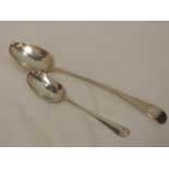 A Georgian silver basting spoon of hanovarian form, London 1805, Thomas Wallis II, and a possible