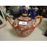 A late Victorian Doulton Lambeth stoneware teapot having floral decoration