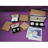 A collection of boxed silver proof coins mainly United Kingdom 5 pence to £2 pound