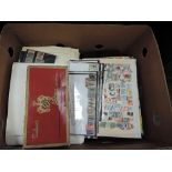 A large collection of World and GB stamps in albums and loose