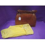 A lady's vintage tan crocodile leather handbag (made in Singapore) having leather lining and clip