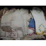 A box of linen including net, embroidered, lace etc