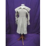 A vintage agricultural worker's linen smock with extensive smocking to body and sleeves with large