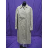 A lady's vintage Burberry mac having the blue label and Burberry check lining, size 16 long