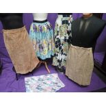 Five assorted lady's vintage skirts including printed floral full skirt with layered underskirt,