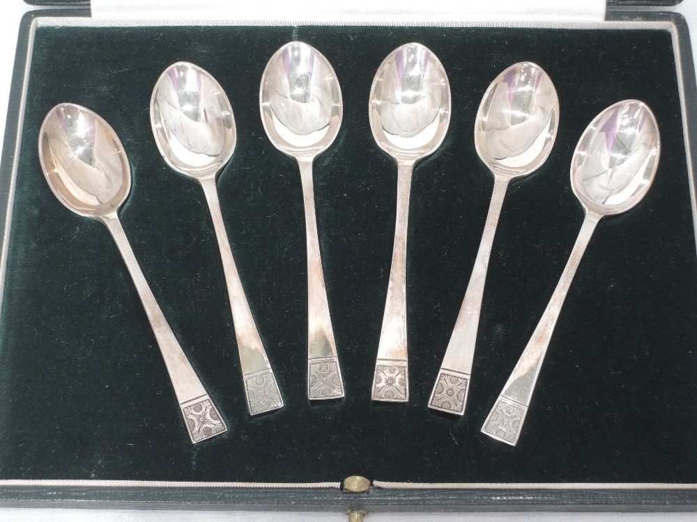 A cased set of six silver teaspoons by Tiffany & Co. London, having engraved terminals, London 1938,