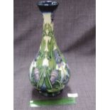 A Moorcroft bottle vase in Wolfsbane pattern, designed by Angi Davenport, numbered 313/350, signed