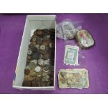 A collection of GB and World coins and banknotes, including silver 1800's five francs, dollar,