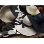 Ten vintage ladies hats including seven crushed linen brimmed hats in navy and cream with ribbon