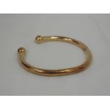 A gents 9ct gold torque bracelet, approx 43.5g