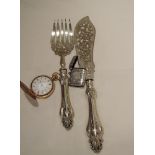 An HM silver vesta having scroll decoration and plain cartouche, pair of silver plated fish