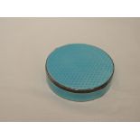 A white metal circular trinket box stamped 935 having turquoise guilloche enamelled decoration