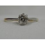 A lady's dress ring having a rose cut diamond solitaire, approx .45ct in a claw mount on a yellow