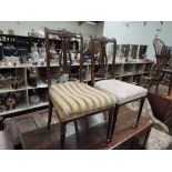 A pair of late Victorian mahogany salon chairs, having Lyre & Adams style backs with later