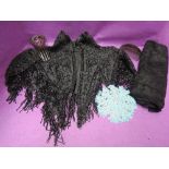 A Victorian black heavily beaded evening shoulder cape having beaded tassel decoration and silk