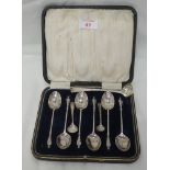 A cased set of six silver Apostle tea spoons Sheffield 1919, James Deakin & Sons, a Georgian