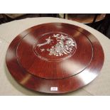 A late 20th century hardwood lazy susan having mother of pearl inlay decoration, in the Chinese