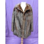 A lady's vintage brown mink hip length jacket